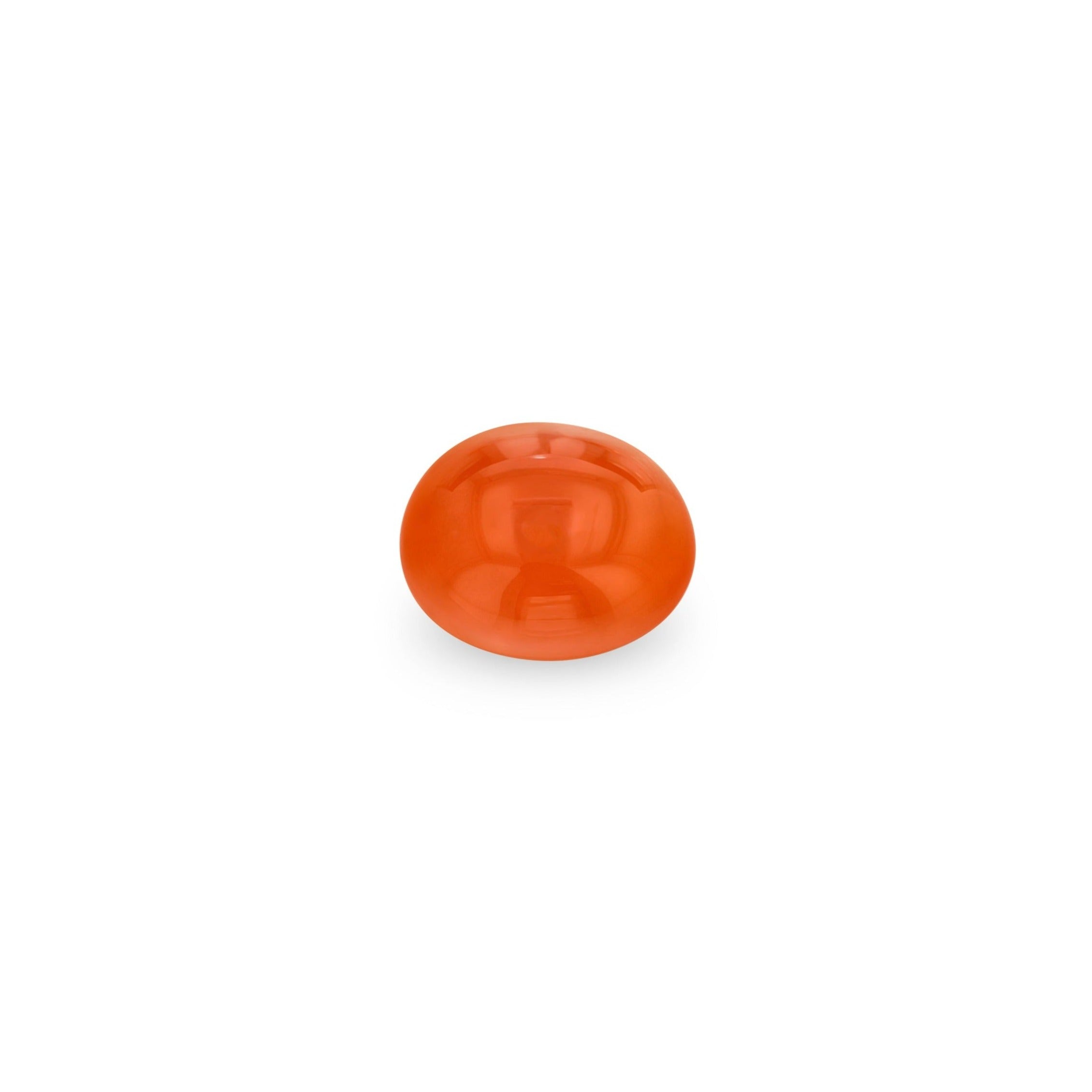 A carnelian cabochon with a smooth, round surface showing shades of fiery red and orange.
