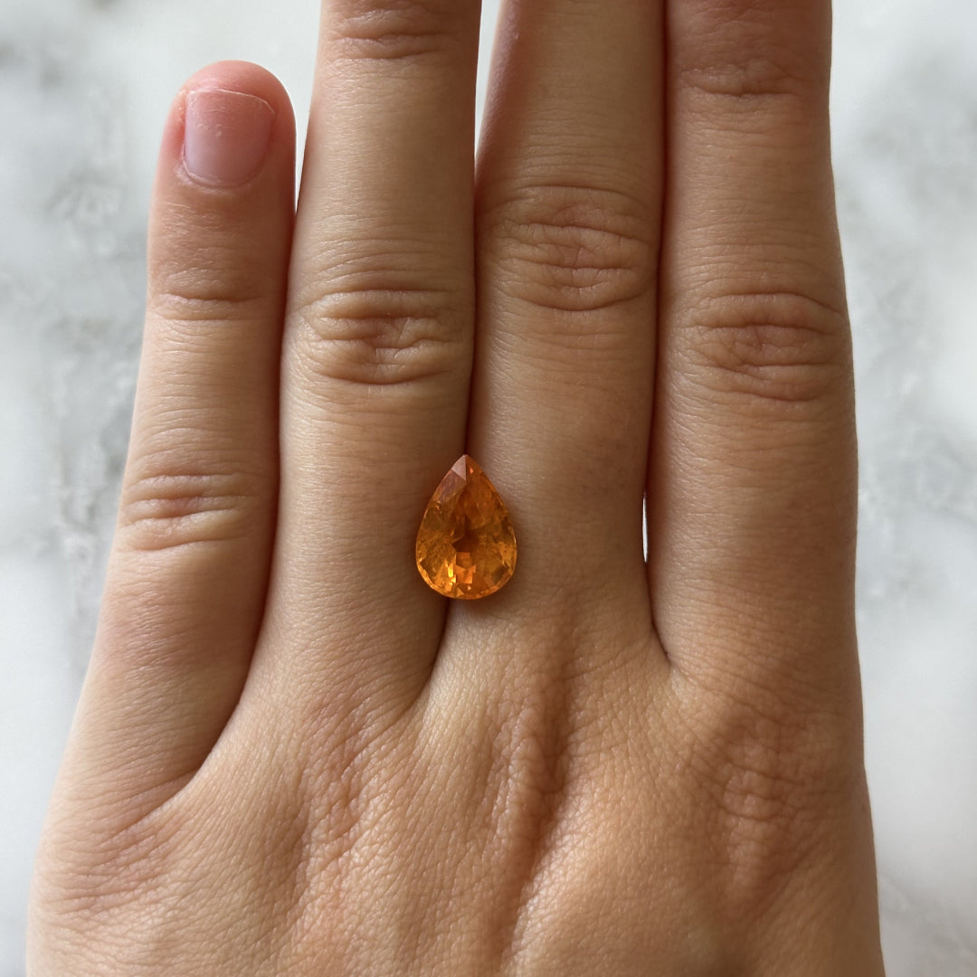 BESPOKE 5.21CT YELLOWISH-ORANGE PEAR SAPPHIRE