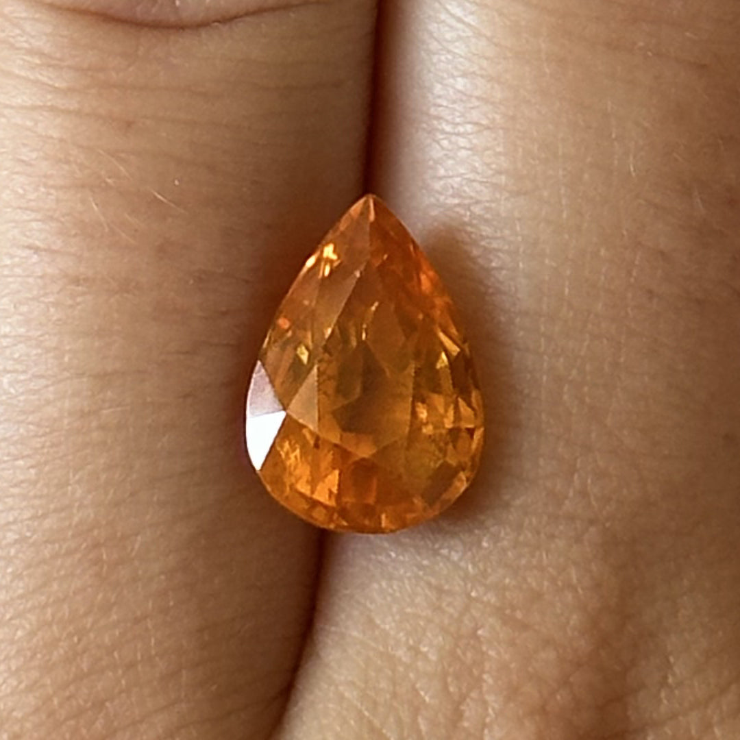 BESPOKE 5.21CT YELLOWISH-ORANGE PEAR SAPPHIRE