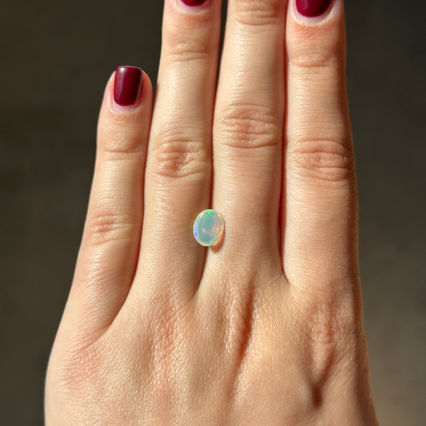 Bespoke 0.84ct Oval Cabochon Opal