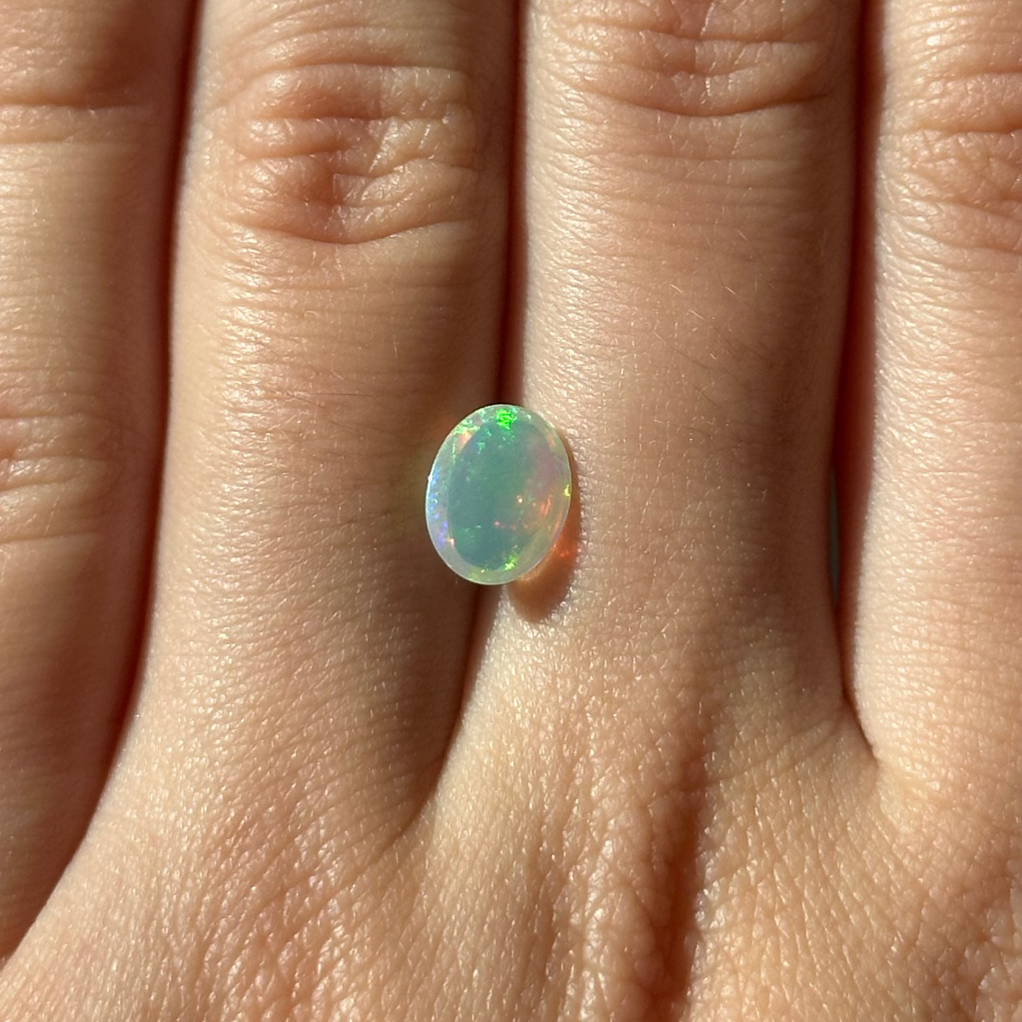 Bespoke 0.84ct Oval Cabochon Opal
