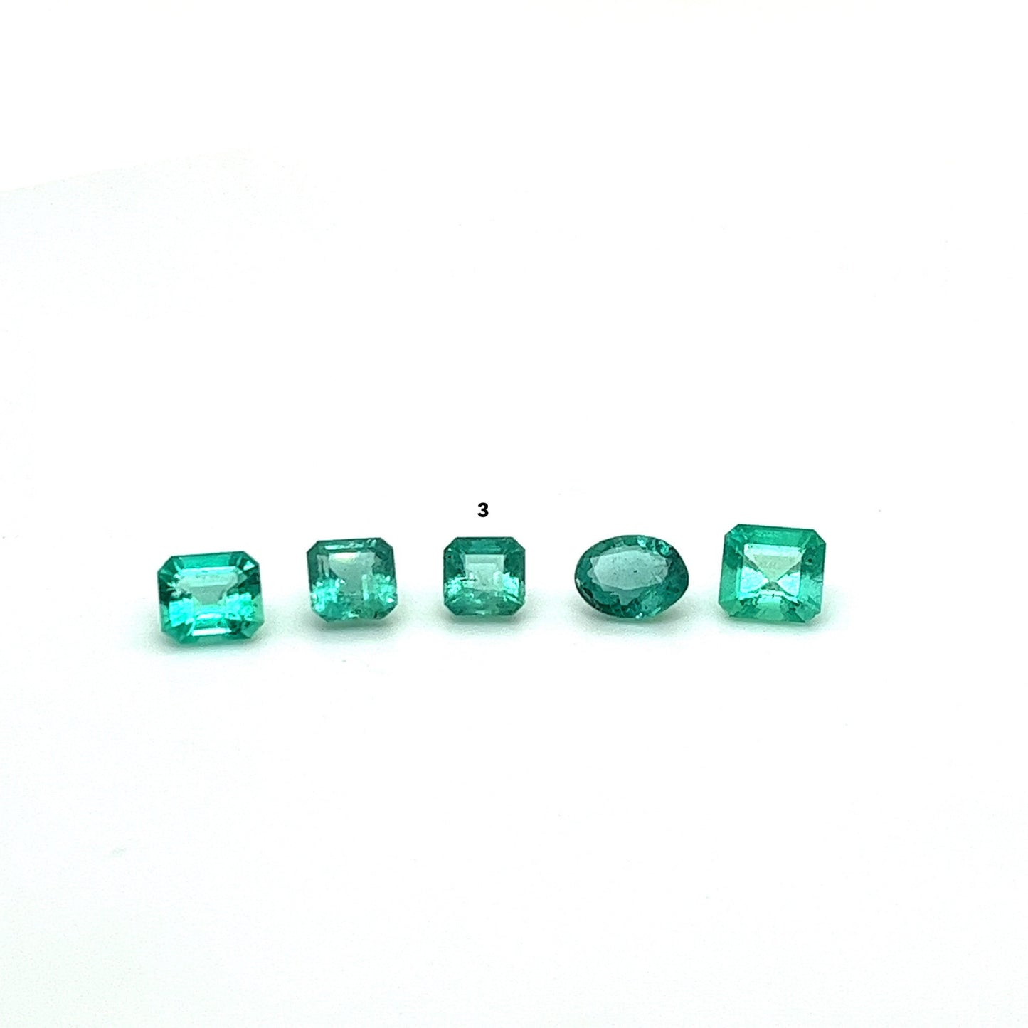 MINI BESPOKE 0.65CT EMERALD RING