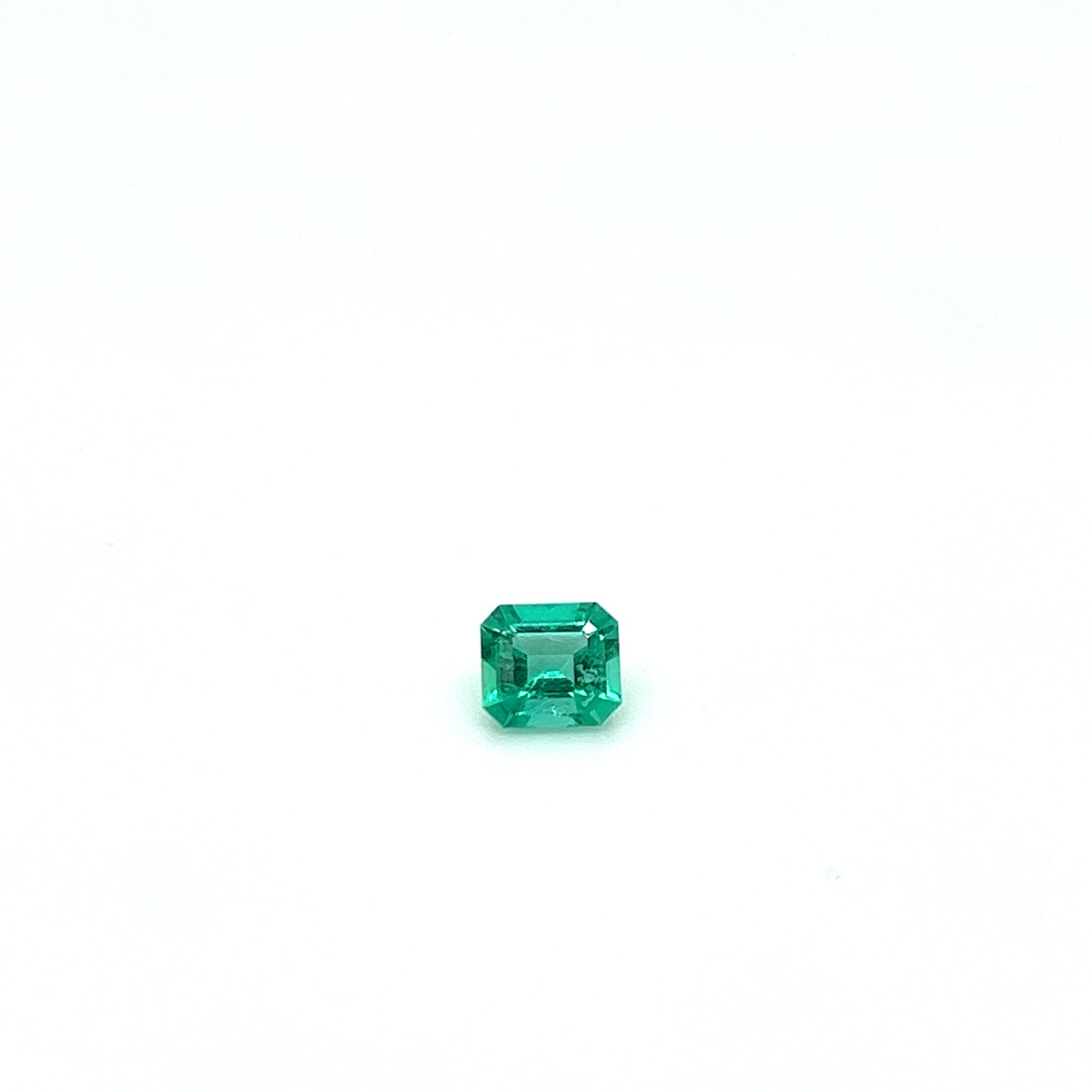 BESPOKE 0.75CT MUZO EMERALD RING