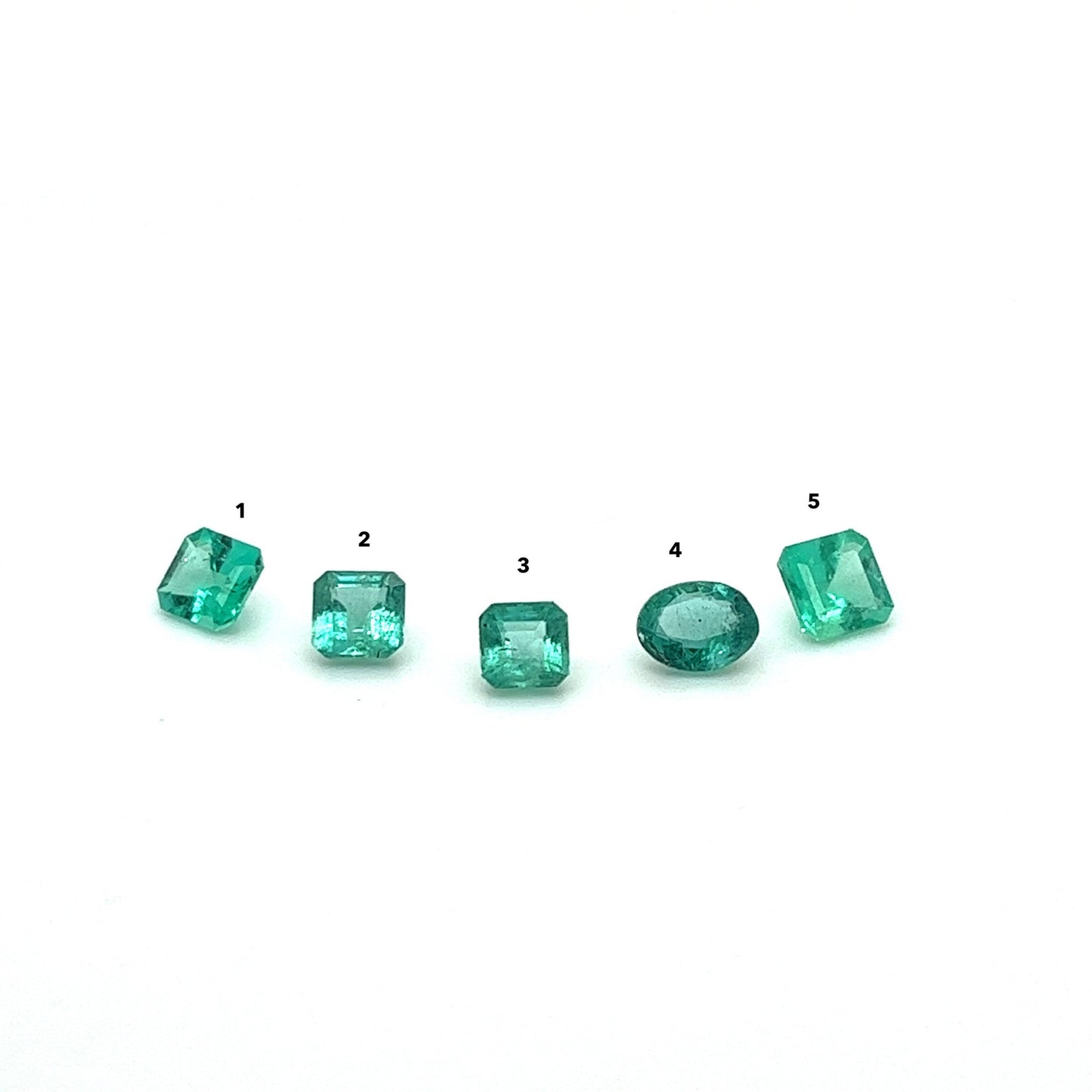 MINI BESPOKE 0.76CT EMERALD RING