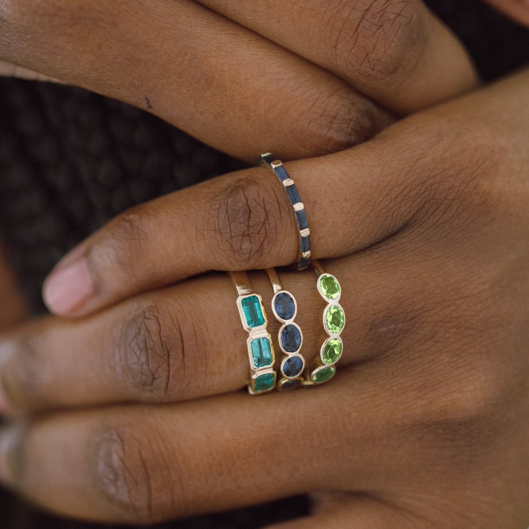 PERIDOT OVAL BEZEL RING