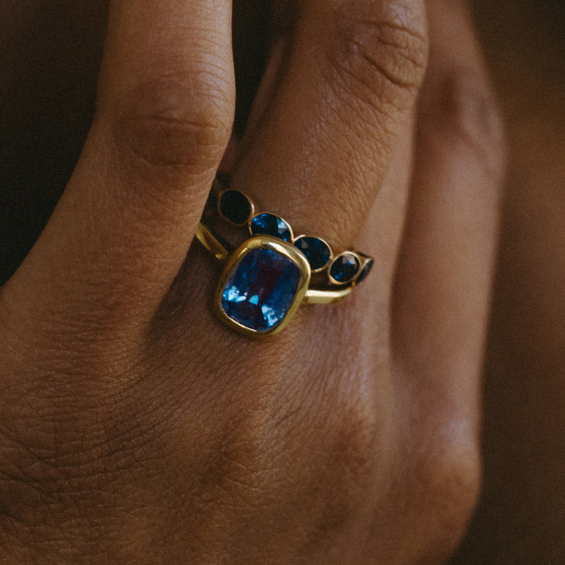 SAPPHIRE BEZEL SET SOLITAIRE RING