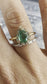 EMERALD BAGUETTE HALO RING