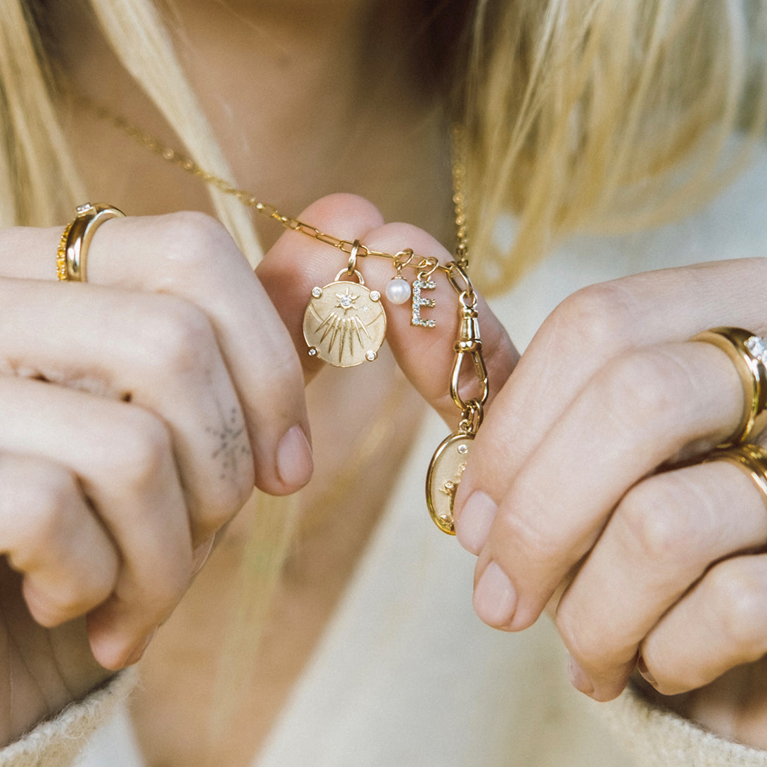 Savvy Collector » Sterling Charm Bracelet with 14 Charms and Heart Padlock  Clasp by Artist UnknownSterling