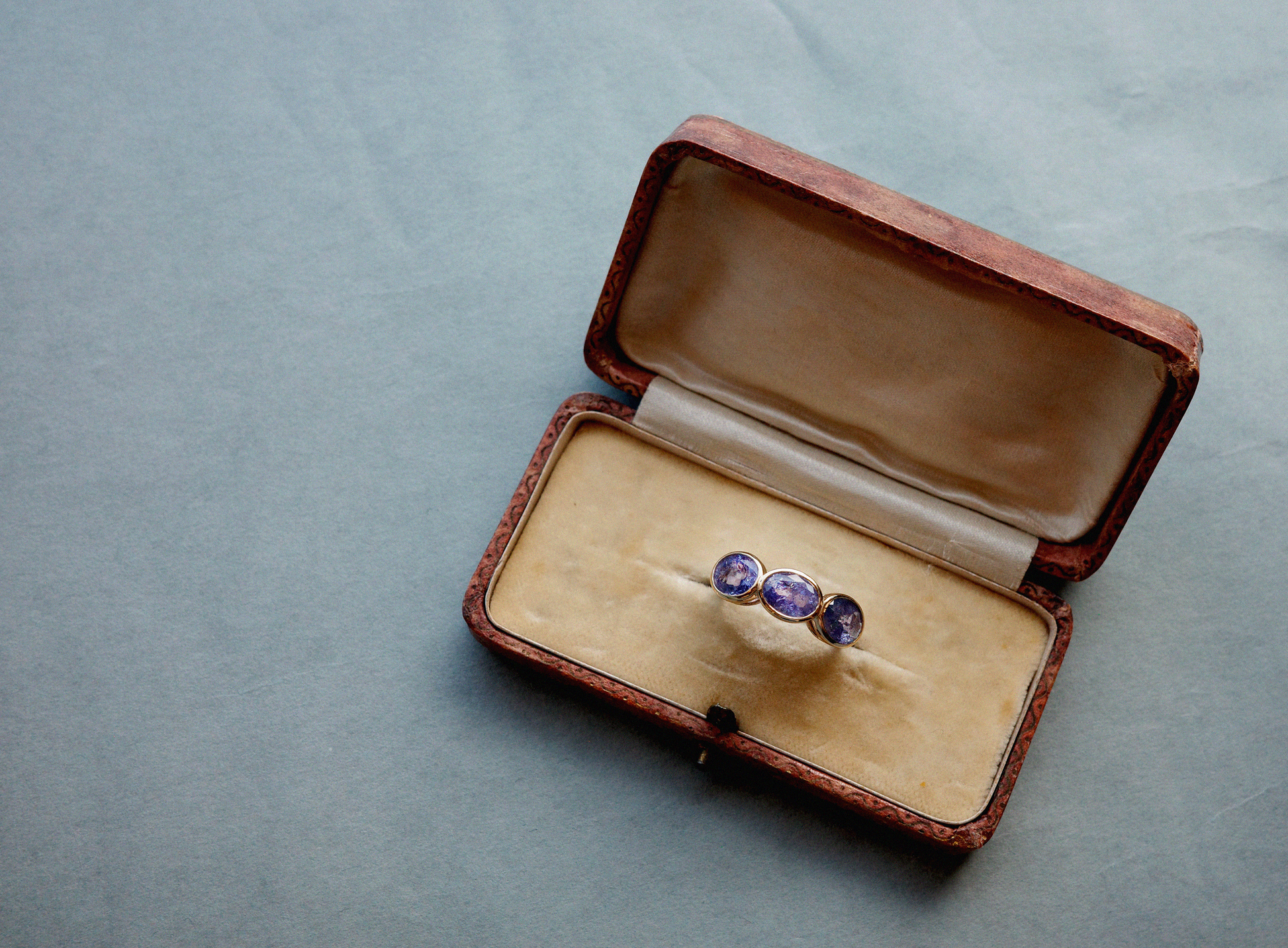 Tanzanite Three Stone Oval Bezel Ring