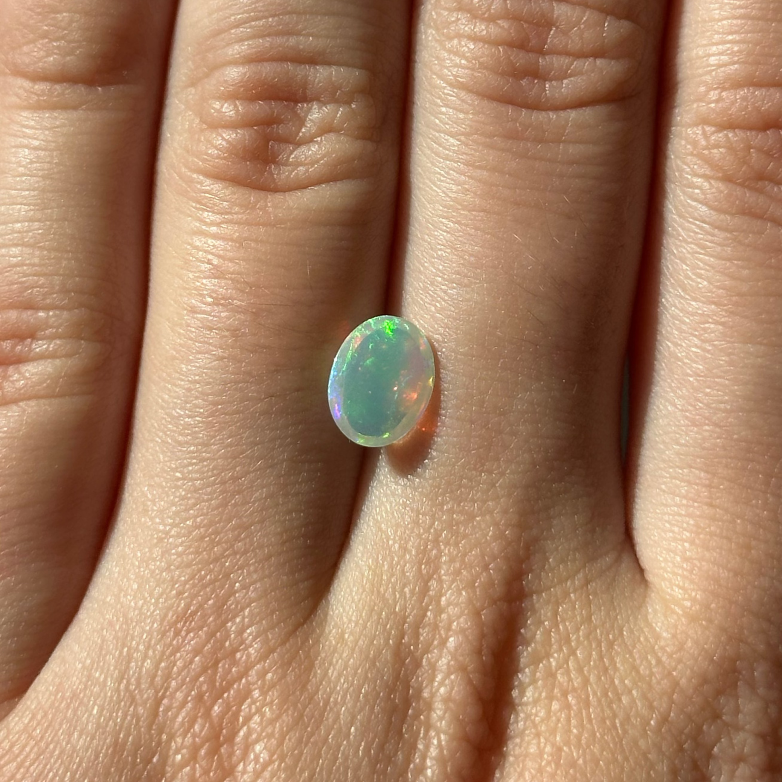 Bespoke 0.84ct Oval Cabochon Opal