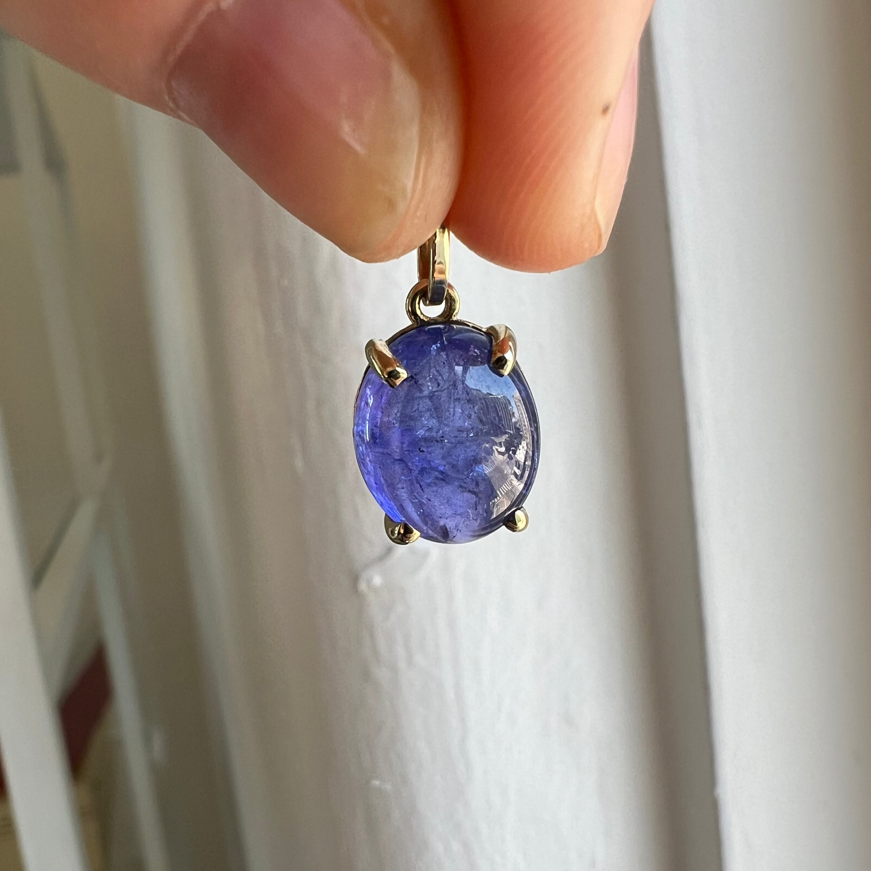 6.54CT TANZANITE CABOCHON PRONG SET CHARM