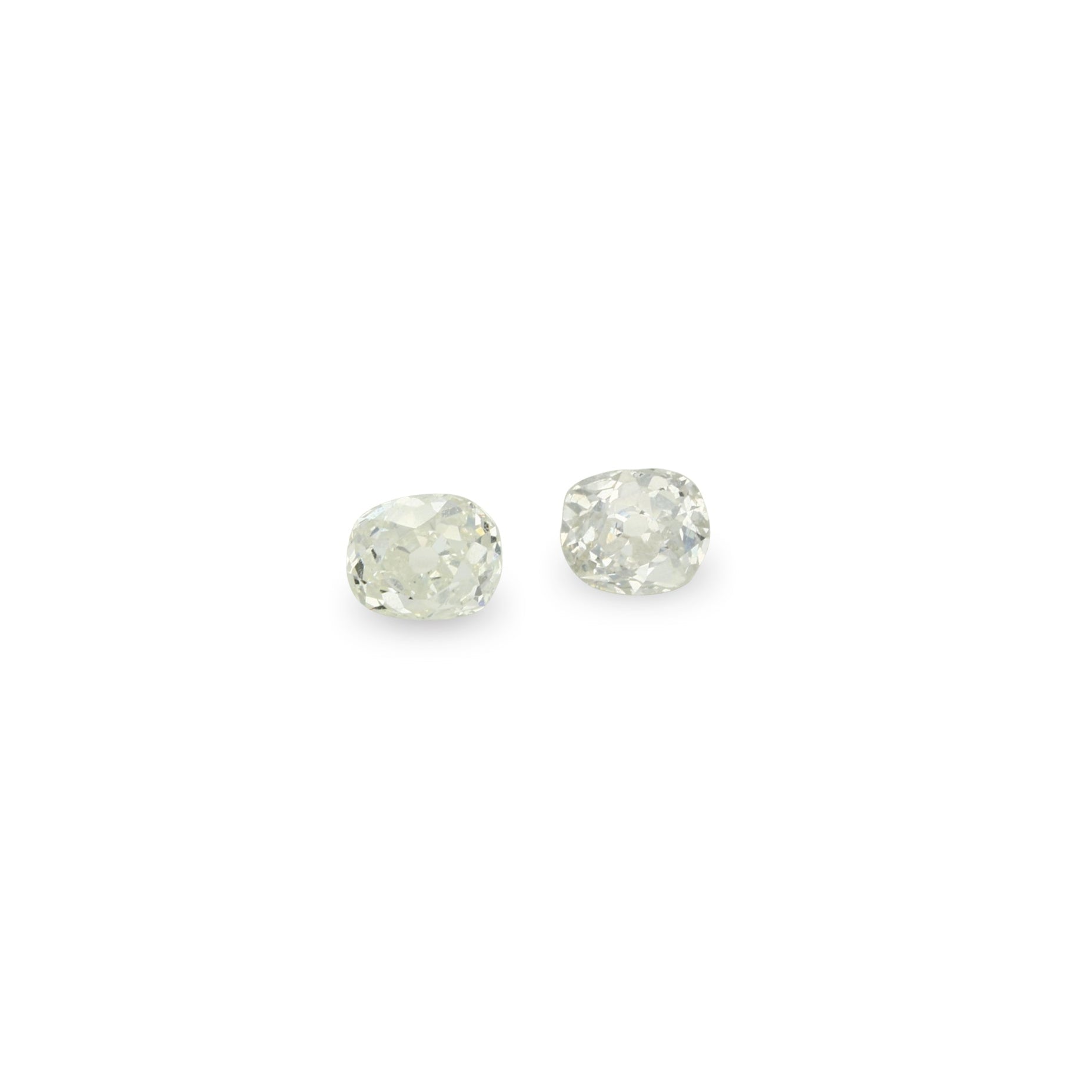 Two round diamonds on a white background
