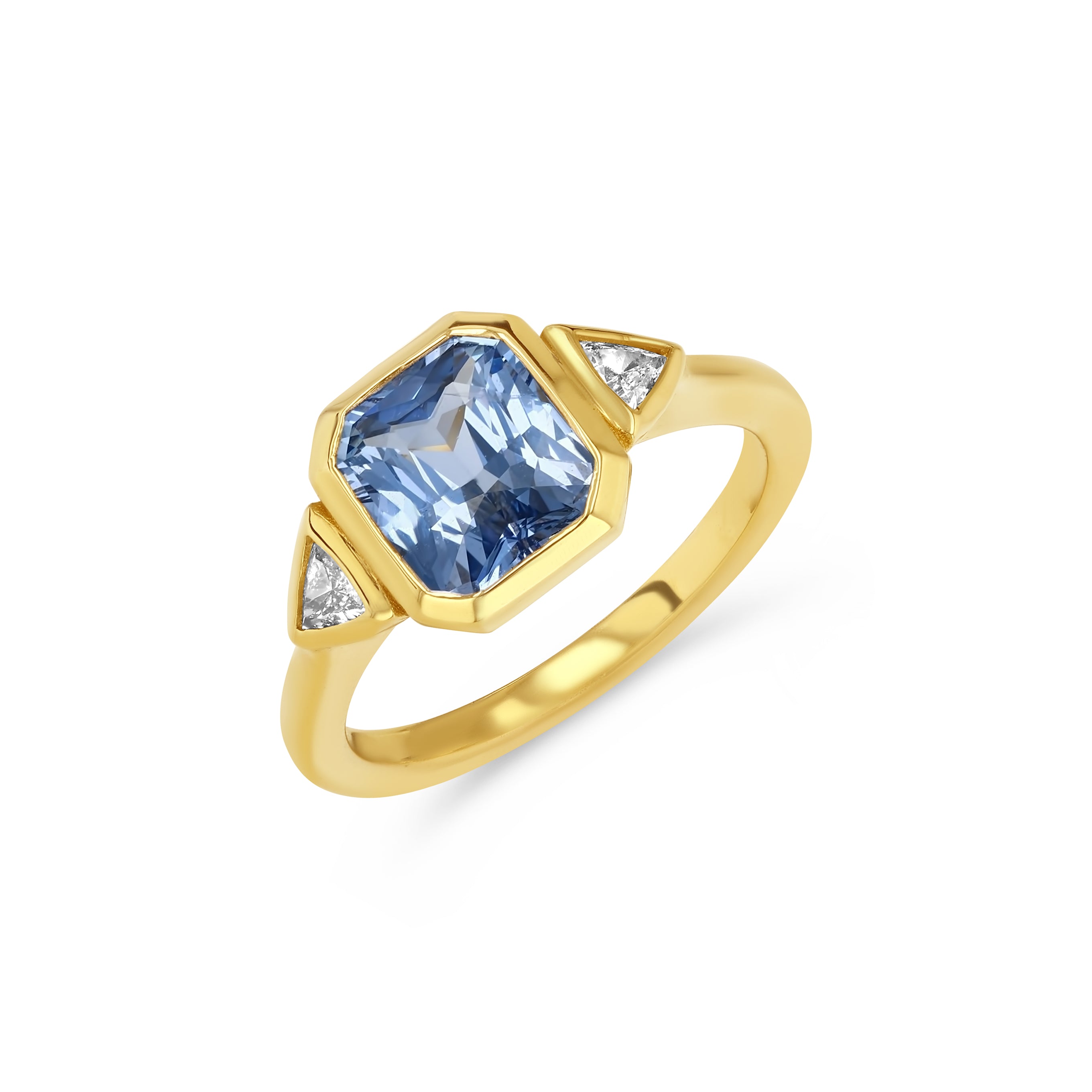 Gold ring with a blue gemstone and small diamonds on a white background