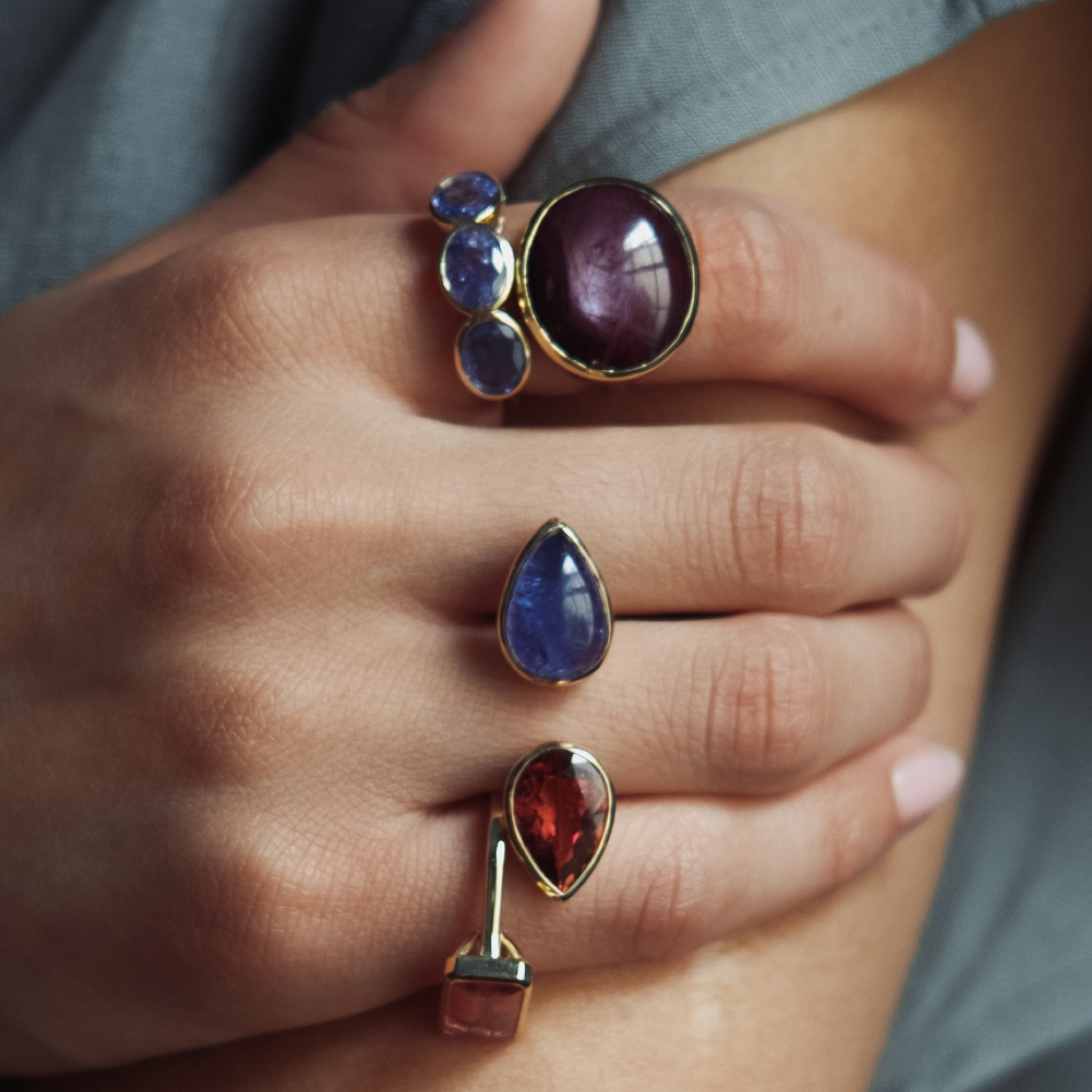 Tanzanite Three Stone Oval Bezel Ring