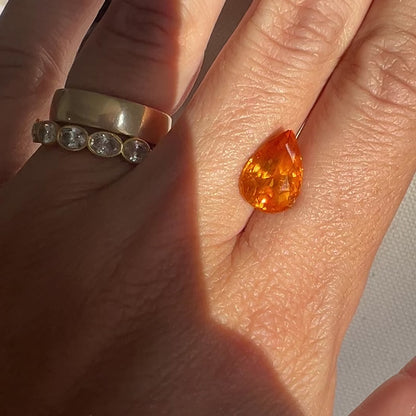 BESPOKE 5.21CT YELLOWISH-ORANGE PEAR SAPPHIRE