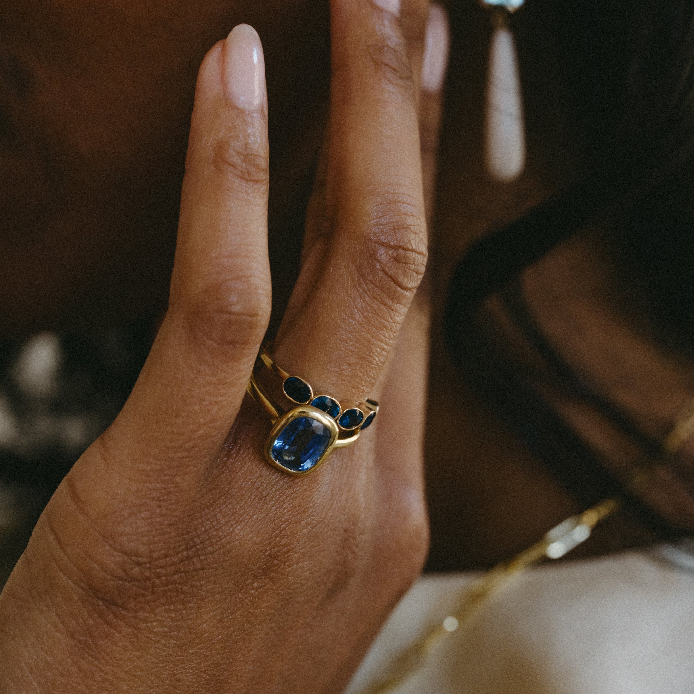 SAPPHIRE BEZEL SET SOLITAIRE RING