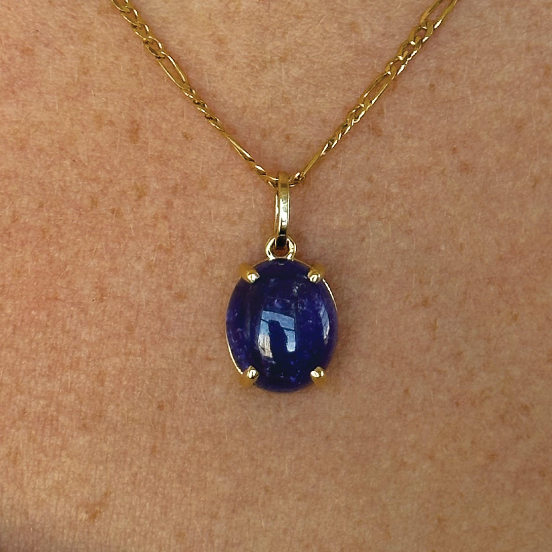 6.54CT TANZANITE CABOCHON PRONG SET CHARM