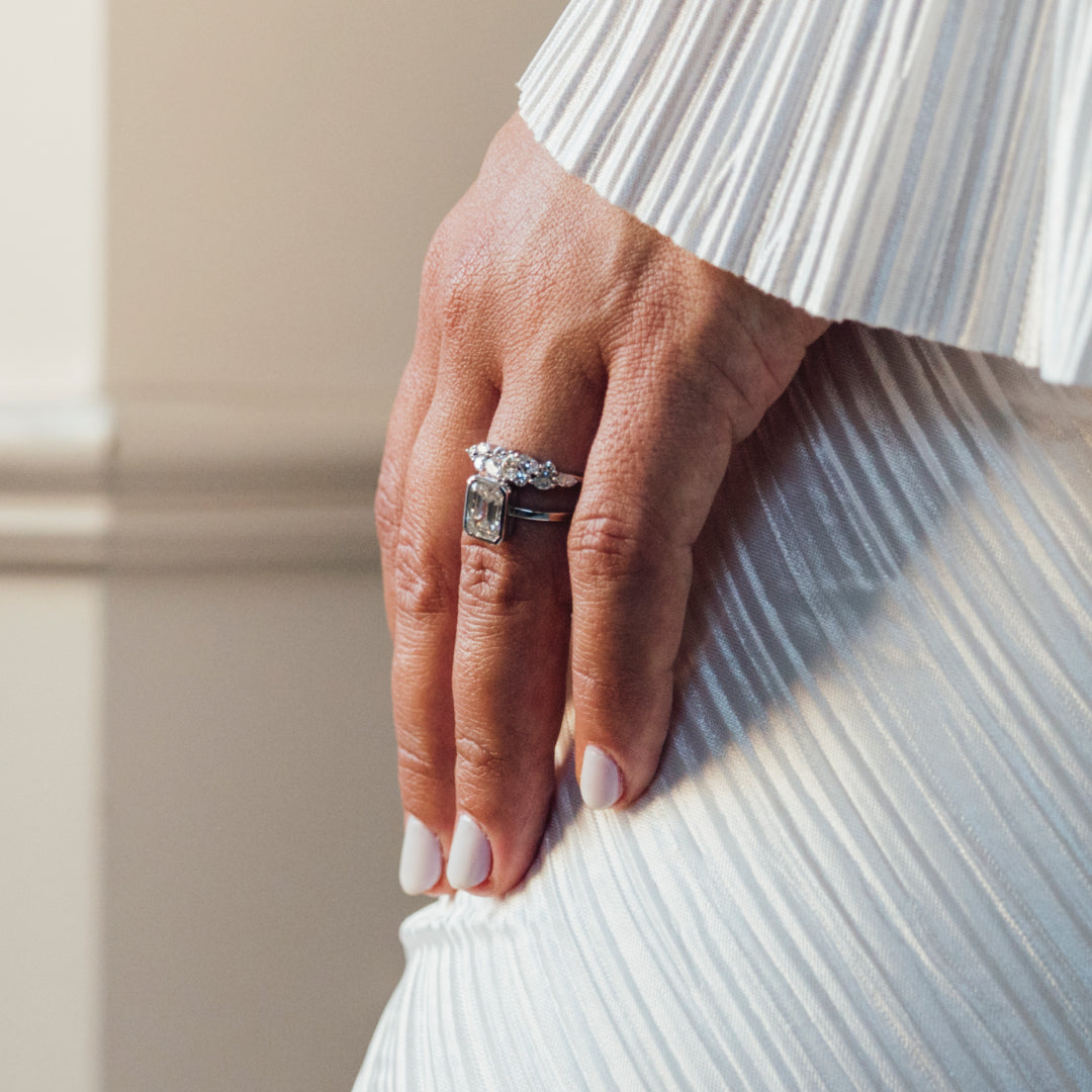 DIAMOND EMERALD CUT BEZEL SET RING