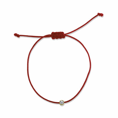 white diamond, yellow gold, red cord