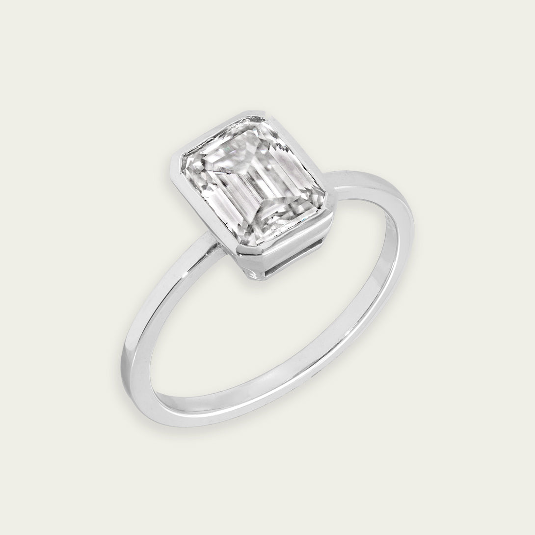 DIAMOND EMERALD CUT BEZEL SET RING